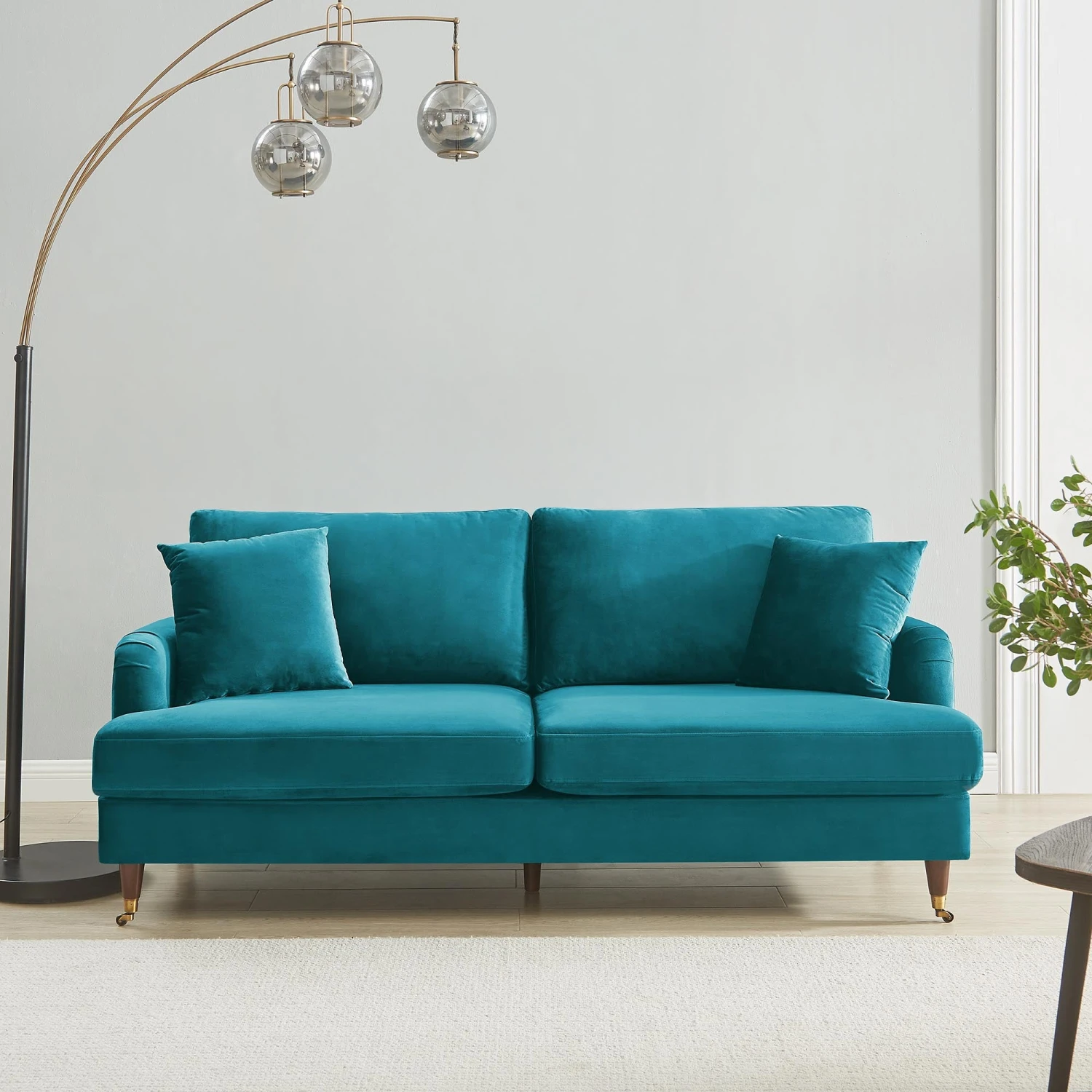 Brigette 3-Seater Teal Velvet Sofa With Antique Brass Castor Legs 1 Brigette 3-Seater Teal Velvet Sofa With Antique Brass Castor Legs