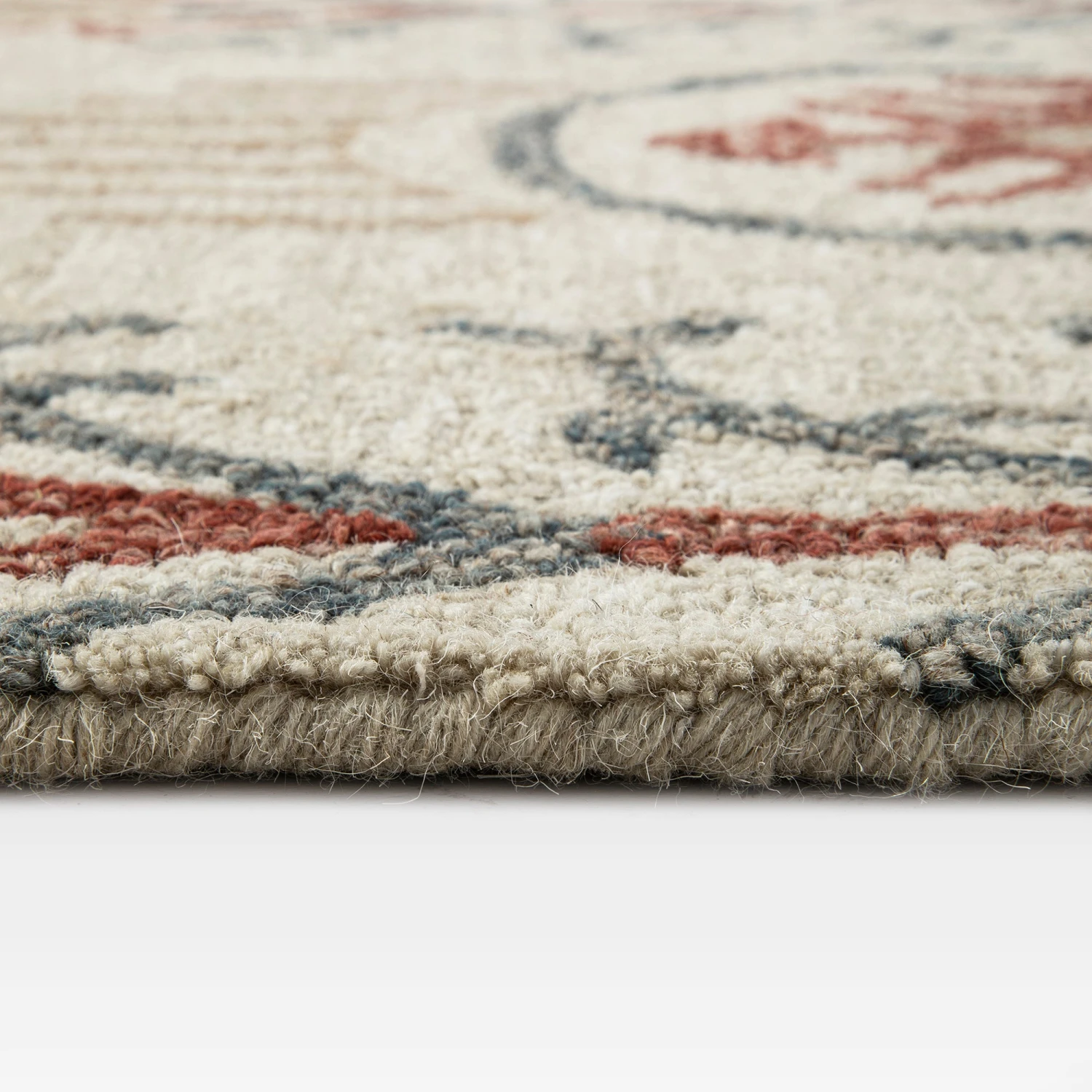 Kadiri Ikat Hand Tufted Wool Rug β Deep Red & Blue Geometric Traditional Indian Area Rug 7 Kadiri Ikat Hand Tufted Wool Rug β Deep Red & Blue Geometric Traditional Indian Area Rug - Image 7