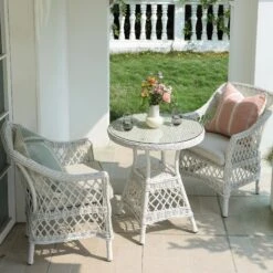 Willowbrook White Lattice Weave Rattan Bistro Set β 3-Piece Outdoor Garden Dining Set 11 Willowbrook White Lattice Weave Rattan Bistro Set β 3-Piece Outdoor Garden Dining Set -Daals Store OD BISTR 2987 WHITE scene2