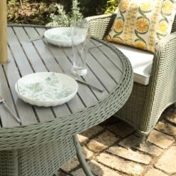 Hampshire 4-Seater Round Wicker Rattan Dining Set, Desert Sage 21 Hampshire 4-Seater Round Wicker Rattan Dining Set, Desert Sage -Daals Store OD DINE 110 GREEN SET scene4