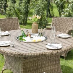 Hampshire 6-Seater Round Wicker Rattan Dining Set With Lazy Susan & Ice Bucket, Natural 19 Hampshire 6-Seater Round Wicker Rattan Dining Set With Lazy Susan & Ice Bucket, Natural -Daals Store OD DINE 135 NAT SET scene3