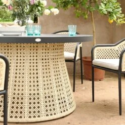 Pienza Outdoor Rattan 6-Seater Round Dining Set, Oatmeal Fabric With Black Frame 16 Pienza Outdoor Rattan 6-Seater Round Dining Set, Oatmeal Fabric With Black Frame -Daals Store OD DINE 2227 BLACK OAT SET scene2
