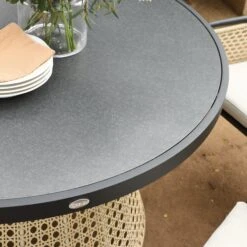 Pienza Outdoor Rattan 6-Seater Round Dining Set, Oatmeal Fabric With Black Frame 20 Pienza Outdoor Rattan 6-Seater Round Dining Set, Oatmeal Fabric With Black Frame -Daals Store OD DINE 2227 BLACK OAT SET scene6