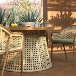 Pienza Outdoor Rattan 6-Seater Round Dining Set, Sage Green Fabric With Light Walnut Frame 16 Pienza Outdoor Rattan 6-Seater Round Dining Set, Sage Green Fabric With Light Walnut Frame -Daals Store OD DINE 2227 WALN GREEN SET scene2