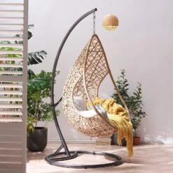 Indra Natural Rattan Effect Hanging Egg Chair β Luxury Outdoor Cocoon Swing Seat with Deep Fill Cushions 11 Indra Natural Rattan Effect Hanging Egg Chair β Luxury Outdoor Cocoon Swing Seat with Deep Fill Cushions -Daals Store OD HC 007 scene2