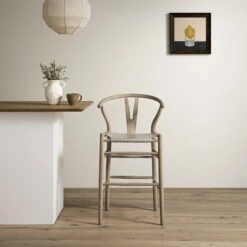Hansel Weathered Elm Solid Wood Counter Stool with Light Grey Faux Leather Seat - Wishbone Style Y-Back Kitchen Island Stool 15 Hansel Weathered Elm Solid Wood Counter Stool with Light Grey Faux Leather Seat - Wishbone Style Y-Back Kitchen Island Stool -Daals Store XN R156 GREYPU scene1