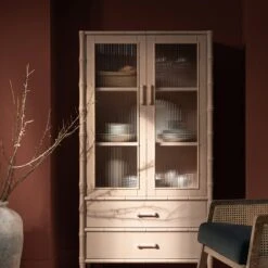 Elstowe Faux Bamboo And Fluted Glass 2-Door Cabinet, Nude Pink 20 Elstowe Faux Bamboo And Fluted Glass 2-Door Cabinet, Nude Pink -Daals Store XXCAB 069 NUDE scene3
