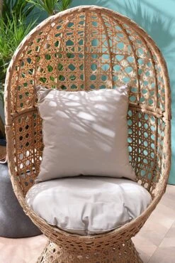 Nerida Natural Rattan Swivel Cocoon Chair β Hand-Woven Egg Chair with Deep-Fill Cushions 10 Nerida Natural Rattan Swivel Cocoon Chair β Hand-Woven Egg Chair with Deep-Fill Cushions -Daals Store YSYG 003 NATURAL scene2